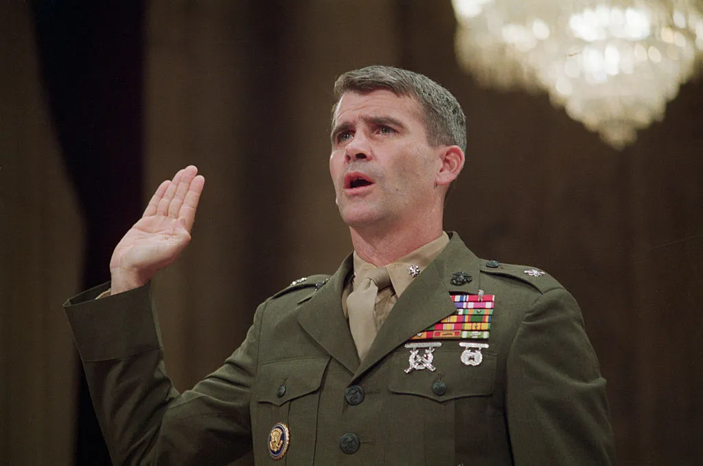 Colonel Oliver North at an Iran-Contra Senate hearing. He was in the
same business as Sarah Connor.
